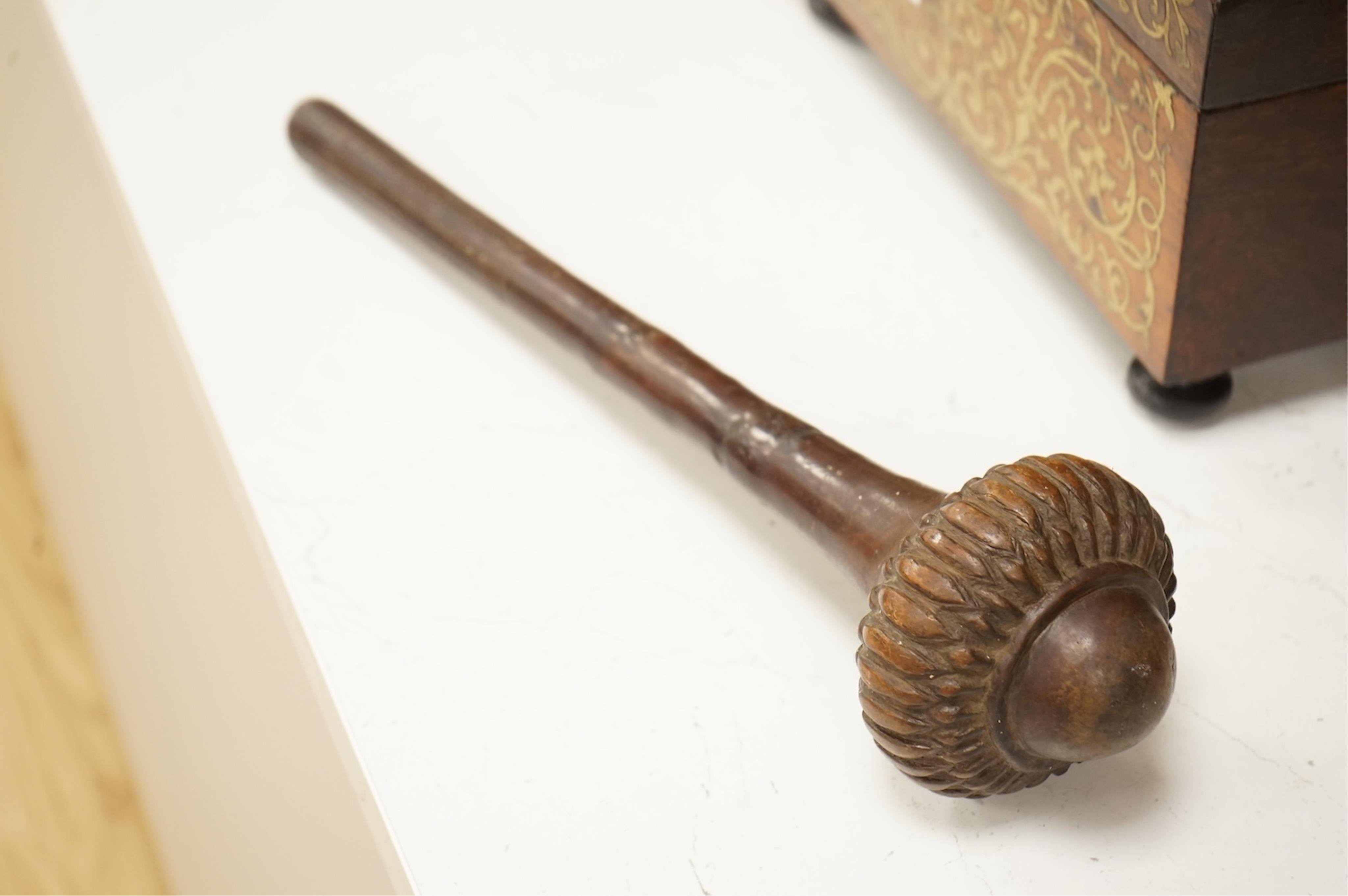 An African tribal knobkerrie with incised decoration to the handle